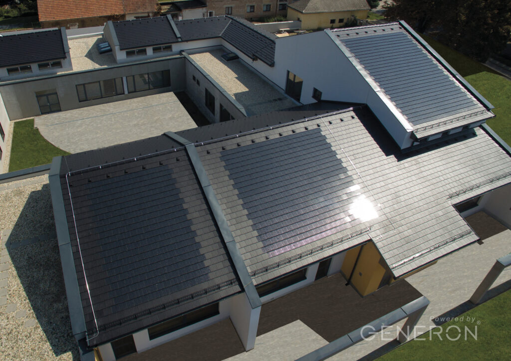 aerial view of home with solar tile roof system