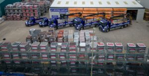 Warehouse with fleet of freight lorries outside