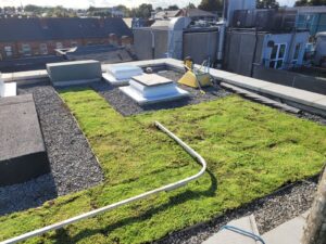 A roof system with Roofbloxx grass and gravel