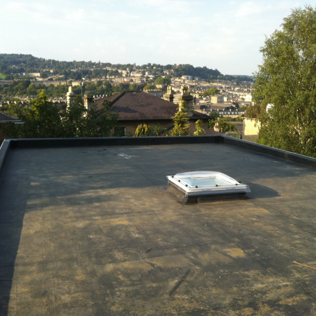 Industrial flat roof with roof window