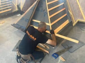 Glidevale-Protect-SkillBuild-competitor-installing-Protect-VP400-roofing-membrane